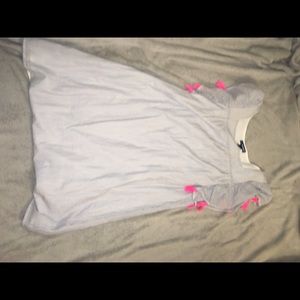 Blue and white dress with pink tassels.